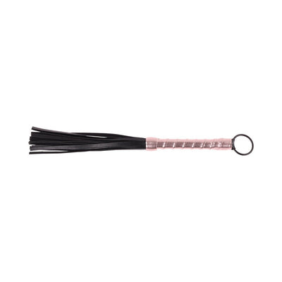 Mini flogger with black faux leather strands and a rose gold textured handle with a ring loop end.