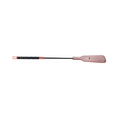 Rose gold and black brat crop with split vegan leather tip and textured rubber handle for grip.