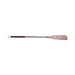 Rose gold and black brat crop with split vegan leather tip and textured rubber handle for grip.