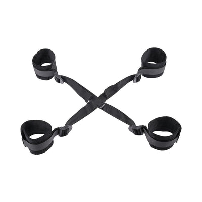 Black adjustable Sportsheets Sex & Mischief Brat Hog Tie with four soft cuffs connected by straps.