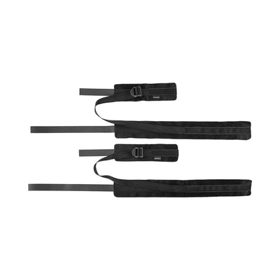 Black adjustable thigh and wrist cuffs connected by straps with secure buckle closures.