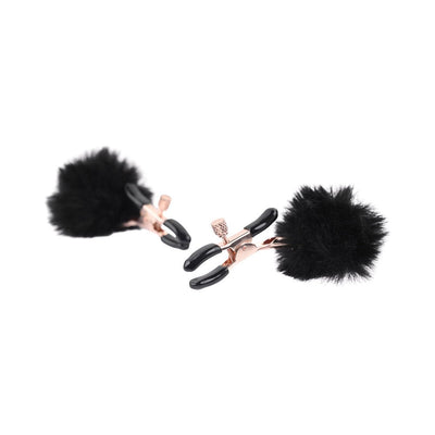 Adjustable metal nipple clamps with black faux fur puffs and rubber tips for gentle, customizable tension.