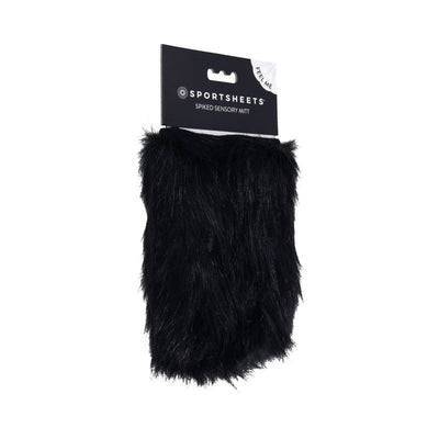 Black faux fur sensory mitt with hidden spikes, packaged with Sportsheets branding and a feel-me tag.