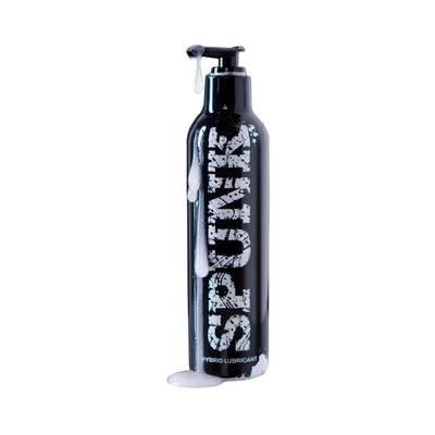 Black bottle of Spunk Lube Hybrid with white creamy lubricant dripping down the sides and pump top against white background.