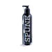 Black bottle of Spunk Lube Hybrid with white creamy lubricant dripping down the sides and pump top against white background.