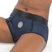 Close-up of a person wearing a navy blue and black EmEx Fit Harness with a front O-ring and elastic waistband.