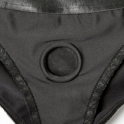 Close-up of black Ss Em.ex. Silhouette Harness featuring a central reinforced O-ring and lace-trimmed edges.