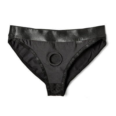 Black low-rise silhouette harness with elastic waistband and central O-ring detail, designed for comfort and secure fit.