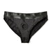 Black low-rise silhouette harness with elastic waistband and central O-ring detail, designed for comfort and secure fit.