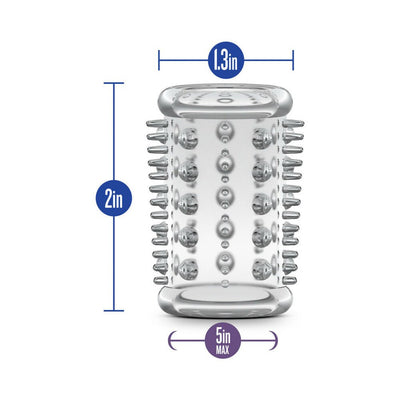 Clear textured cock sleeve with raised ticklers, measuring 2 inches long and 1.3 inches wide, fits up to 5 inches in length.