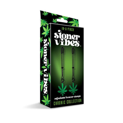 Stoner Vibes Chronic Collection adjustable tweezer nipple clamps with green cannabis leaf charms in black packaging.