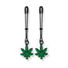 Pair of black adjustable tweezer nipple clamps with green cannabis leaf charms and removable rubber tips.