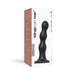 Packaging of Strap-on-me Dildo Plug Balls size L showing a black triple pearl-shaped silicone plug with suction base.