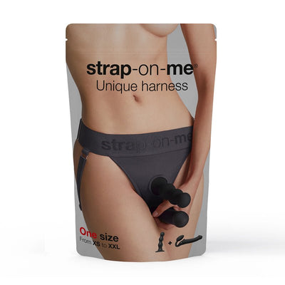 Grey adjustable strap-on harness worn on hips with dual ring design shown on packaging.