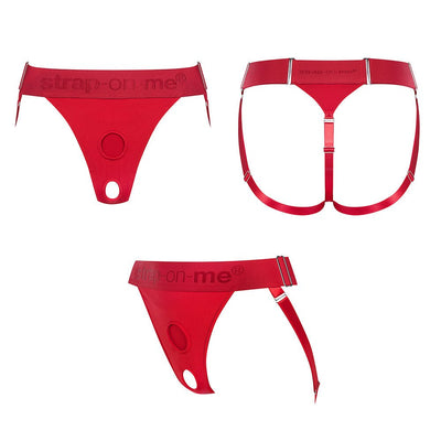 Red adjustable strap-on harness with dual rings and elastic waistband shown from front, back, and side views.
