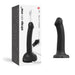Black semi-realistic silicone strap-on dildo with squirting feature, size small, shown with packaging and tube attachment.