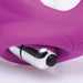Close-up of pink silicone strapless dildo with a silver vibrating bullet insert and black power button.