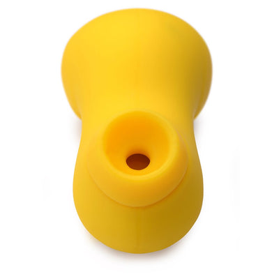 Yellow silicone clitoral stimulator with a rounded suction tip and ergonomic design on a white background.