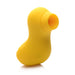Yellow duck-shaped clitoral stimulator with soft silicone suction tip and ergonomic design on white background.