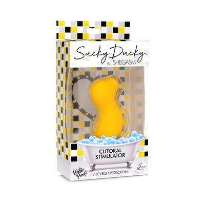 Yellow duck-shaped clitoral stimulator in clear packaging with checkered yellow, black, and white design and bathtub illustration.