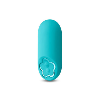 Teal mini bullet vibrator with smooth silicone finish and flower-shaped control button on white background.