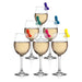 Six wine glasses with colorful playful drink markers clipped on the rims for easy identification at parties.