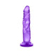 Purple translucent realistic dildo with suction cup base standing upright on white background.