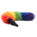 Black silicone butt plug with a long, fluffy rainbow-colored faux fur tail in red, orange, yellow, green, blue, and purple.