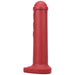 Red silicone mini toy inspired by Amsterdam traffic barriers with a rounded top and flat base.