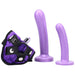 Purple strap-on harness kit with two silicone dildos and a small silver bullet vibrator in a matching purple harness.