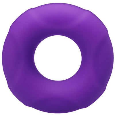 Small purple silicone Tantus Buoy C-ring with a smooth, slightly textured surface and circular shape.