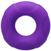 Small purple silicone Tantus Buoy C-ring with a smooth, slightly textured surface and circular shape.