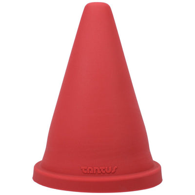Red cone-shaped silicone stretch toy with wide base and Tantus logo embossed on the front.