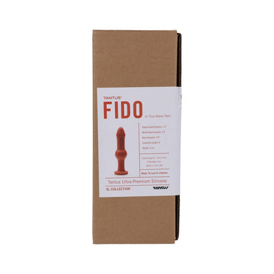Tantus Fido-1 red silicone anal toy in plain brown box with product label showing size and features.