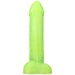 Bright green realistic silicone dildo with a flared base, standing upright on a white background.