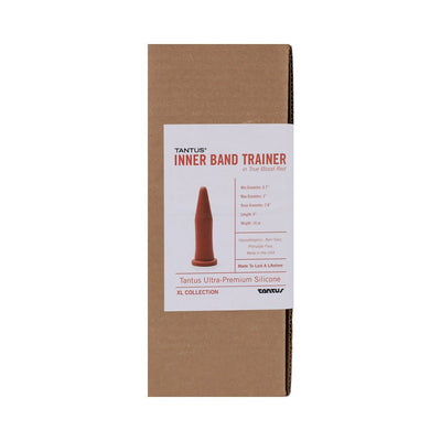 Tantus Inner Band Trainer in crimson red with product details on a brown cardboard box label.