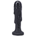 Black silicone fantasy dildo with textured drip design and flared base, standing upright on a white background.