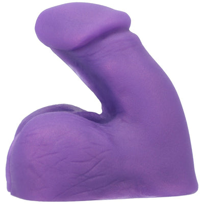 Purple silicone packer with realistic texture and shape designed for comfortable everyday wear.