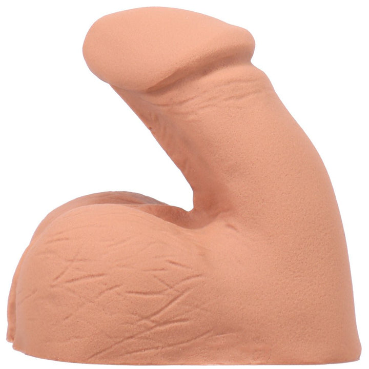 Tantus On the Go Silicone Packer in natural skin tone with realistic texture and flexible design for comfortable everyday wear.
