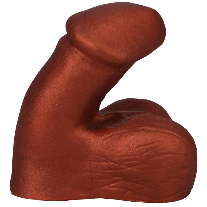 Compact brown silicone packer with realistic texture and a wide base for comfortable, secure wear.