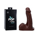 Dark brown silicone packer with realistic texture and packaging box labeled Pop n' Play by Tantus.