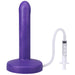 Purple slim silicone squirting dildo with attached clear tubing and syringe for fluid release.