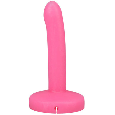 Pink slim silicone squirting dildo with a rounded tip and flat base designed for strap-on use.