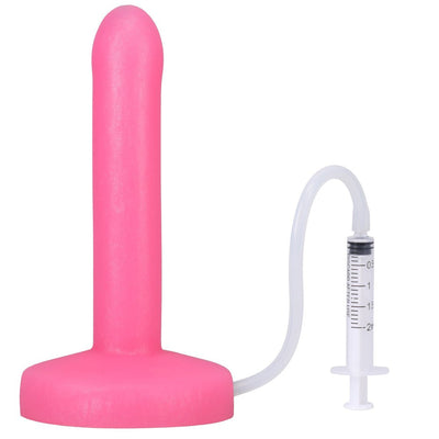 Pink slim silicone squirting dildo with attached clear tube and syringe for fluid release.