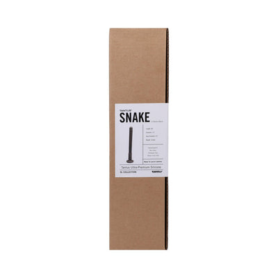 Tantus Snake black silicone exploration toy in tall rectangular brown cardboard box with product label.