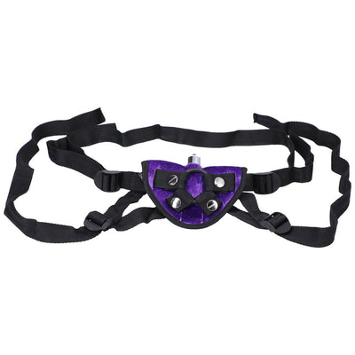 Adjustable black strap-on harness with purple velvet front panel and secure snap buttons.