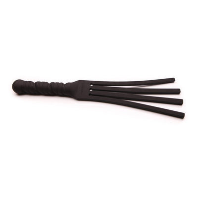 Black silicone Tawse It Overboard paddle with four flexible tongues and textured handle.