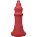 Red silicone pleasure device with tiered, textured design and wide base, standing upright on white background.