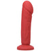 Crimson red realistic textured silicone dildo with a suction cup base standing upright on white background.