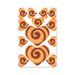 Sheet of heart-shaped edible pasties and wraps with cinnamon roll swirl design in shades of brown and orange.